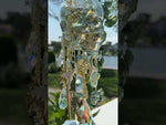 Mystic Crystal Skull Follydust Bottle Wind Chime (Goldtone)